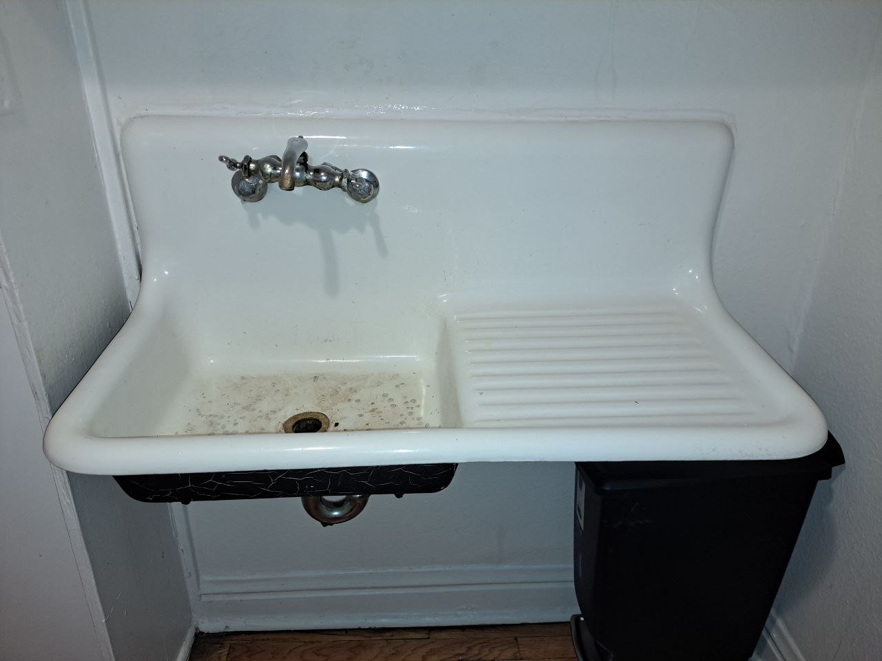 Before — chipped bathroom sink